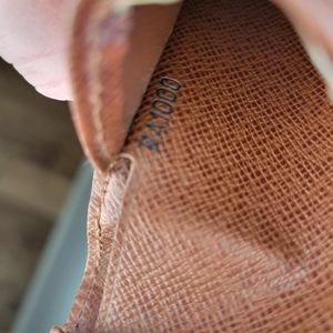 Vintage Louis Vuitton monogram brown billfold.